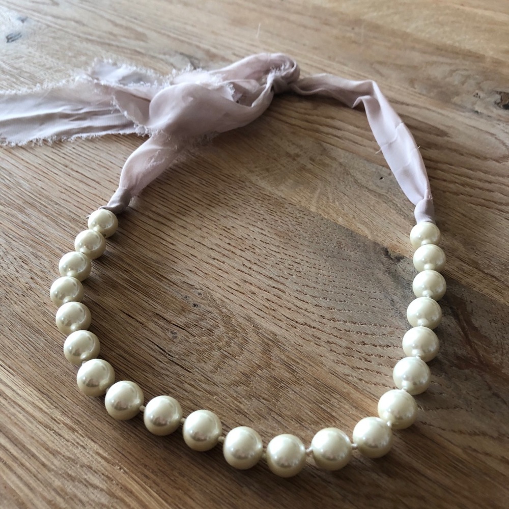 Club Monaco silk tie and pearl necklace